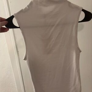 Sleeveless White Turtleneck Top